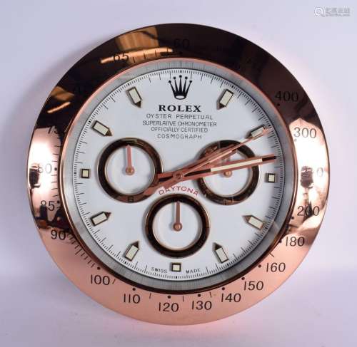 A ROLEX SHOP DISPLAY ADVERTISING WALL CLOCK. 33 cm diameter.