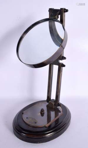 A CONTEMPORARY MAGNIFYING GLASS. 43 cm high extended.