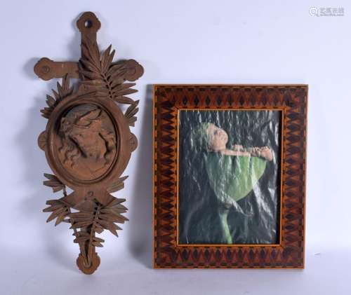 AN ANTIQUE BLACK FOREST CARVED WOOD PLAQUE together with an ...