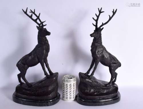 A LARGE PAIR OF CONTEMPORARY BRONZE STAGS. 44 cm x 17 cm.