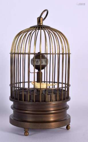 A AUTOMATON BIRD CAGE CLOCK. 15 cm high.