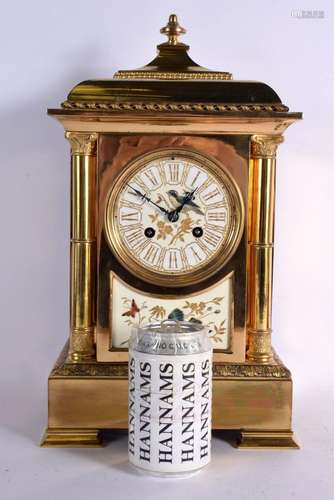 AN EARLY 20TH CENTURY FRENCH BRONZE AND ENAMEL CLOCK painted...