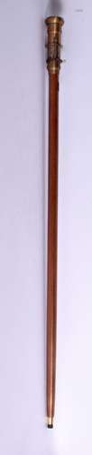 A NOVELTY TELESCOPE COMPASS WALKING CANE. 90 cm long.