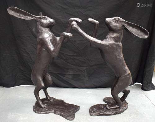 A LARGE PAIR OF CONTEMPORARY BRONZE BOXING HARES. 82 cm x 42...