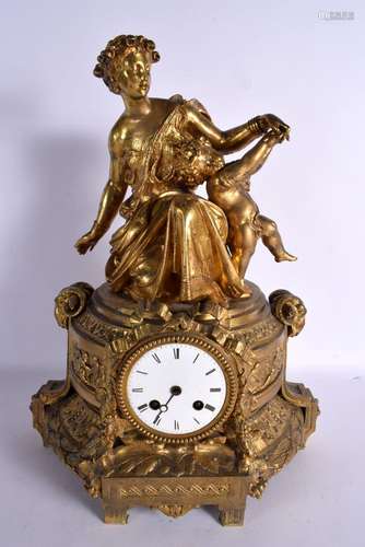 A LARGE 19TH CENTURY FRENCH GILT METAL MANTEL CLOCK with fig...