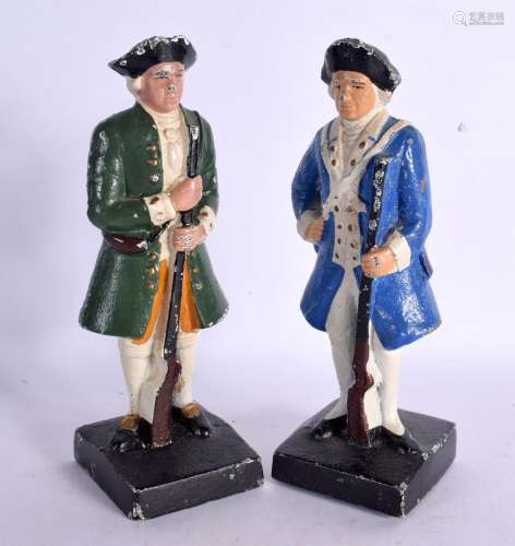 TWO VINTAGE CAST IRON SOLDIERS 19 cm high.