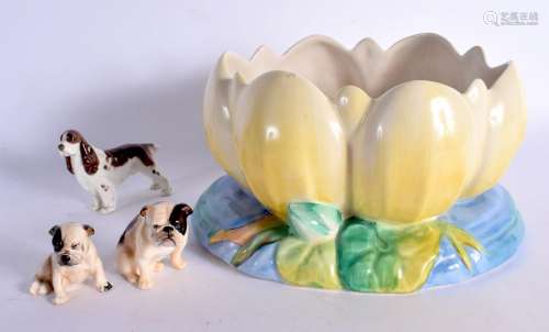 A CLARICE CLIFF LOTUS BOWL together with three royal doulton...
