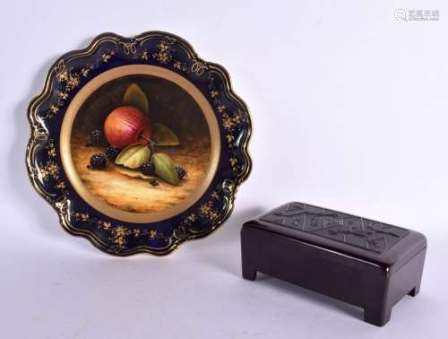 A COALPORT PLATE and a bakelite box. Plate 21 cm wide. (2)