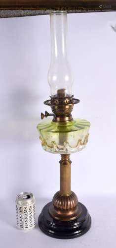 A LARGE VICTORIAN GLASS OIL LAMP. 62 cm high.