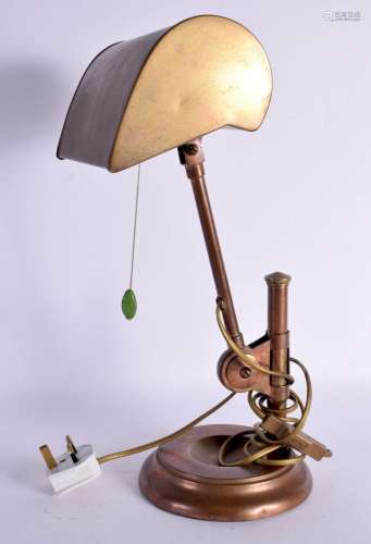 A VINTAGE COPPER EXTENDING DESK LAMP. 40 cm high.