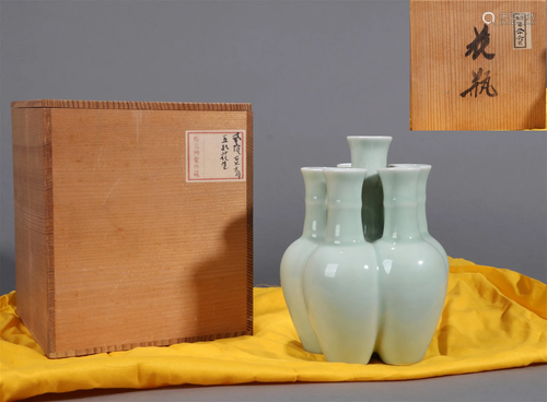 A CELADON-GLAZED FIVE-HOLE VASE