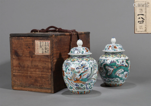 A PAIR OF DOUCAI GLAZED DRAGON AND PHOENIX JAR WITH LID