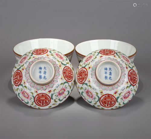 A PAIR OF FAMILLE ROSE FLOWER LONGEVITY PATTERN BOWLS WITH L...