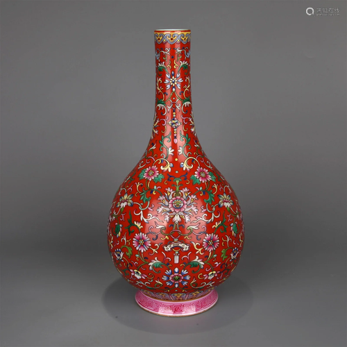 A RED GROUND YANGCAI-GLAZED TREASURED FLOWER VASE