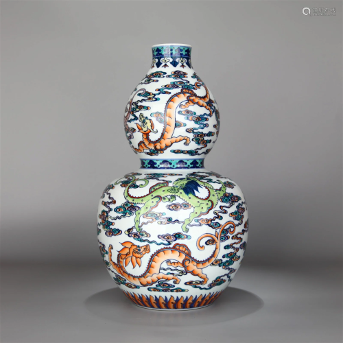 A DOUCAI GLAZED CLOUD AND DRAGON PATTERN DOUBLE-GOURD FORM V...
