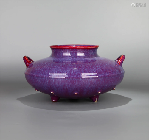 A FLAMBE-GLAZED TRIPOD CENSER WITH DOUBLE DRUM EARED