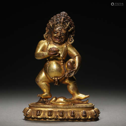 A Tibetan Bronze-gilt Jambhala