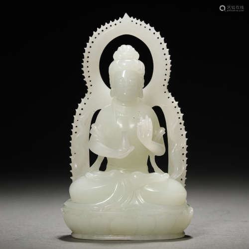 A Chinese Carved White Jade Seated Guanyin
