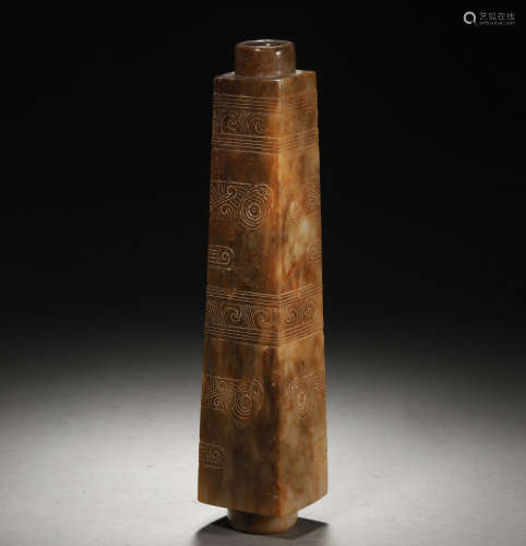 A Chinese Carved Russet Jade Cong