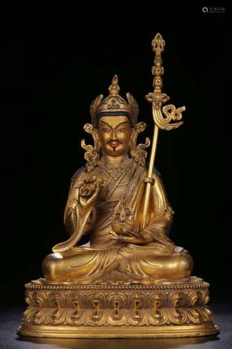 Bronze gilt lotus sitting statue