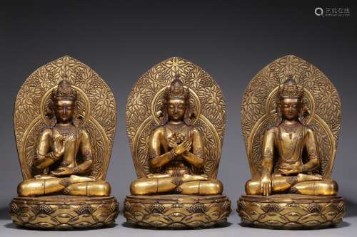A bronze statue of a golden Buddha in Qing Dynasty