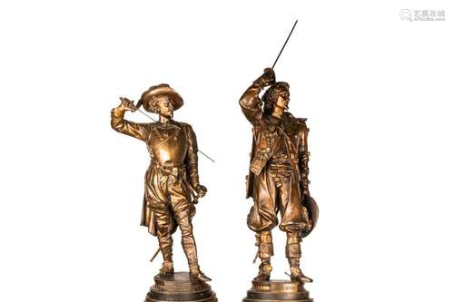 PAIR OF PATINATED METAL CAVALIERS ON PEDESTALS