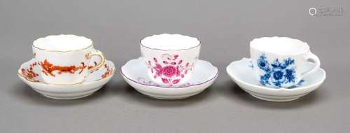 Three demitasse cups with saucers,