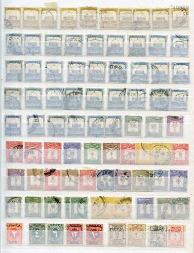 A collection of Palestine stamps in an album