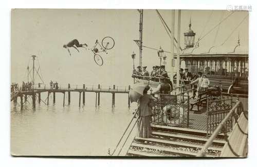 BRIGHTON. A collection of 14 postcards of pier divers at Bri...