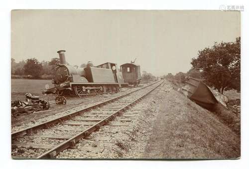 COCKING. A photographic postcard identified as a train derai...