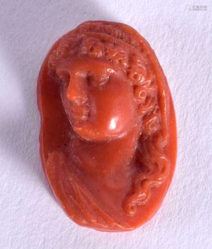 A MINIATURE CORAL CARVING OF A CLASSICAL MALE. 2.4cm x 1.6cm...