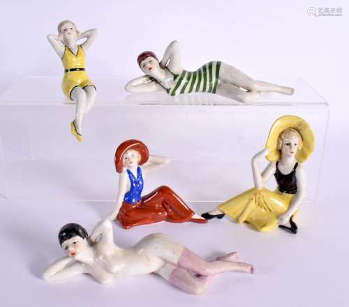 FIVE ART DECO PORCELAIN FIGURES OF LADIES IN VARIOUS POSES. ...