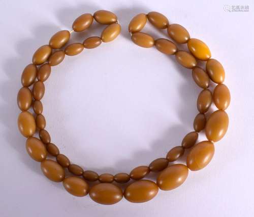 A HORN TYPE GRADUATED BEAD NECKLACE. Largest bead Weight 86g...