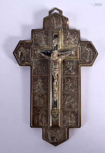 A BRASS PLAQUE DEPICTING THE CRUCIFIX SURROUNDED WITH SCENES...