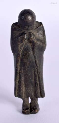AN EARLY BRONZE FIGURE OF A CLOAKED MALE. 7.1cm x 2.3cm x 1....