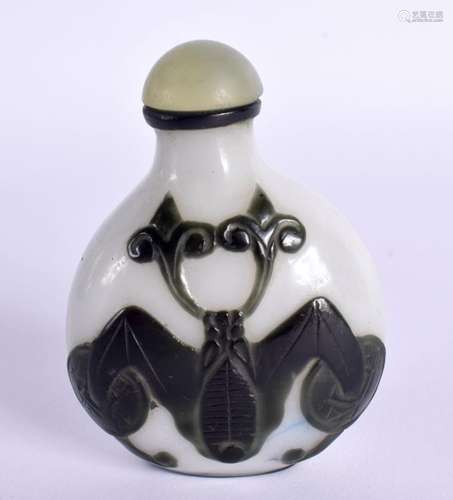 A PEKING GLASS SNUFF BOTTLE OVERLAID WITH A BAT. 7.2cm x 5.3...