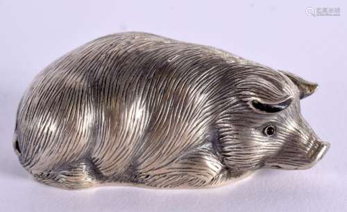 A CONTINENTAL SILVER PIG WITH GEM SET EYES. Stamped 88, 2.4c...