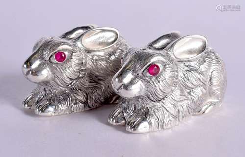 A PAIR OF SILVER RABBIT CONDIMENTS. 116 grams. 5.75 cm x 3 c...