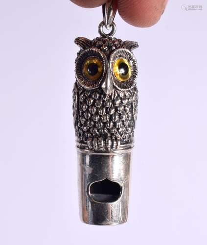 A SILVER OWL WHISTLE. 18 grams. 4.5 cm x 1.25 cm.