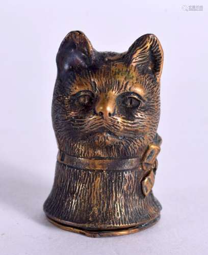 A BRASS CAT HEAD VESTA CASE. 3.5 cm x 2 cm.