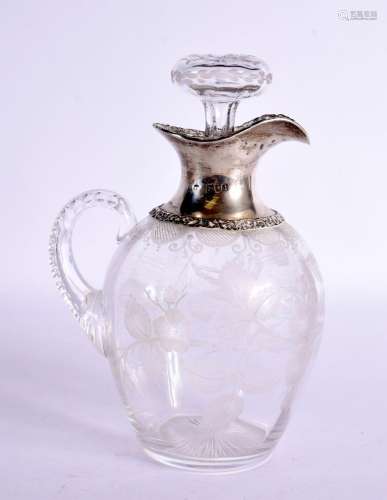 AN ANTIQUE ENGRAVED SILVER MOUNTED GLASS DECANTER. London 18...
