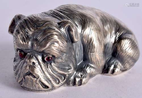 A CONTINENTAL SILVER MODEL OF A SEATED DOG WITH GEM SET EYES...