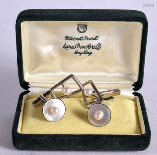 TWO PAIRS OF MIKIMOTO SILVER AND PEARL CUFFLINKS AND BOX. St...