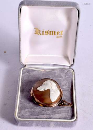 A CASED 9CT GOLD MOUNTED DOG CAMEO BROOCH. 3.8cm x 3.3cm, we...