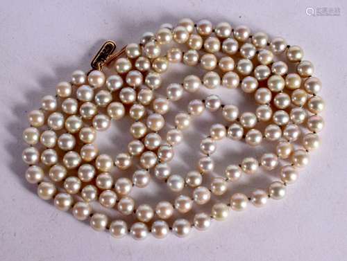 A CULTURED PEARL NECKLACE WITH 9CT GOLD CLASP. Stamped Birmi...