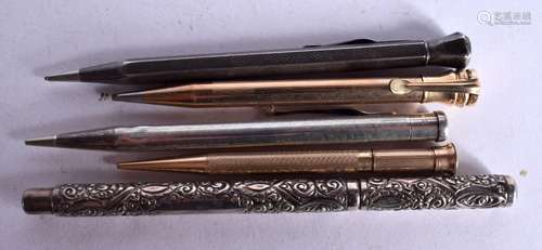 4 PROPELLING PENCILS AND A INK PEN. Various marks. 13.5cm lo...