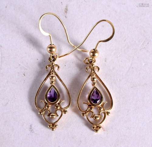 A PAIR OF 9CT GOLD EARRINGS WITH AN AMETHYST. 4cm drop, weig...