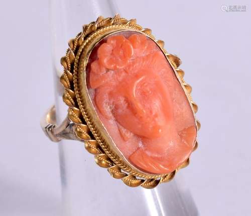 A VICTORIAN 9CT GOLD AND CORAL CAMEO RING. Size M, weight 5....