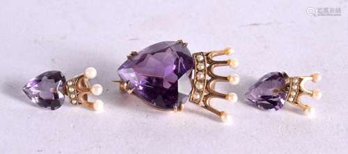 AN EDWARDIAN SUITE OF 9CT GOLD AND AMETHYST BROOCH AND EARRI...