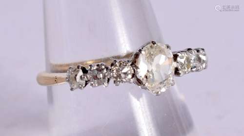 AN 18CT SET WITH 7 DIAMONDS RING. Centre stone 0.5ct, Size P...